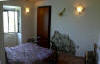Camera appartamento Portico.